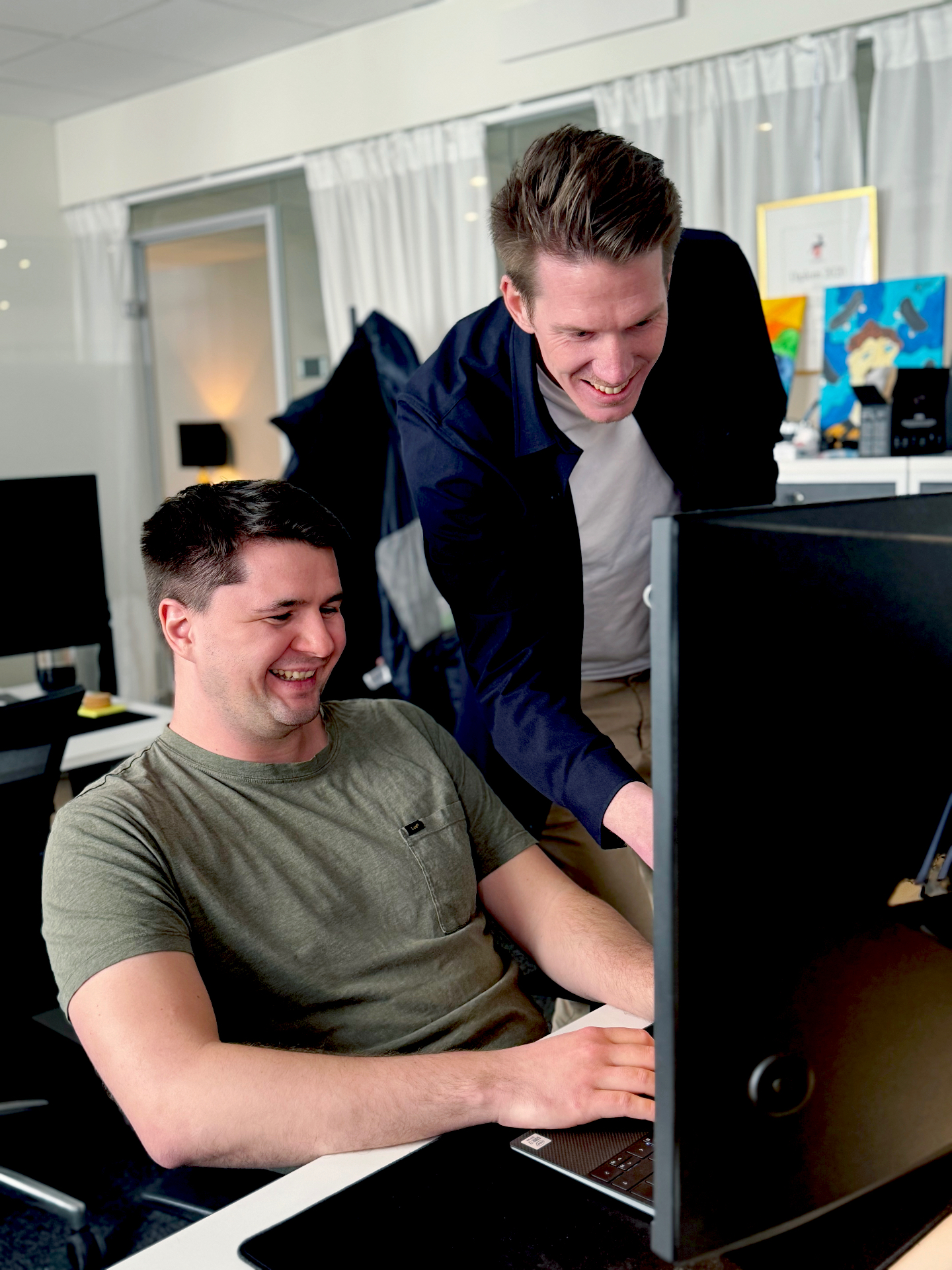 Two colleagues solving a problem together